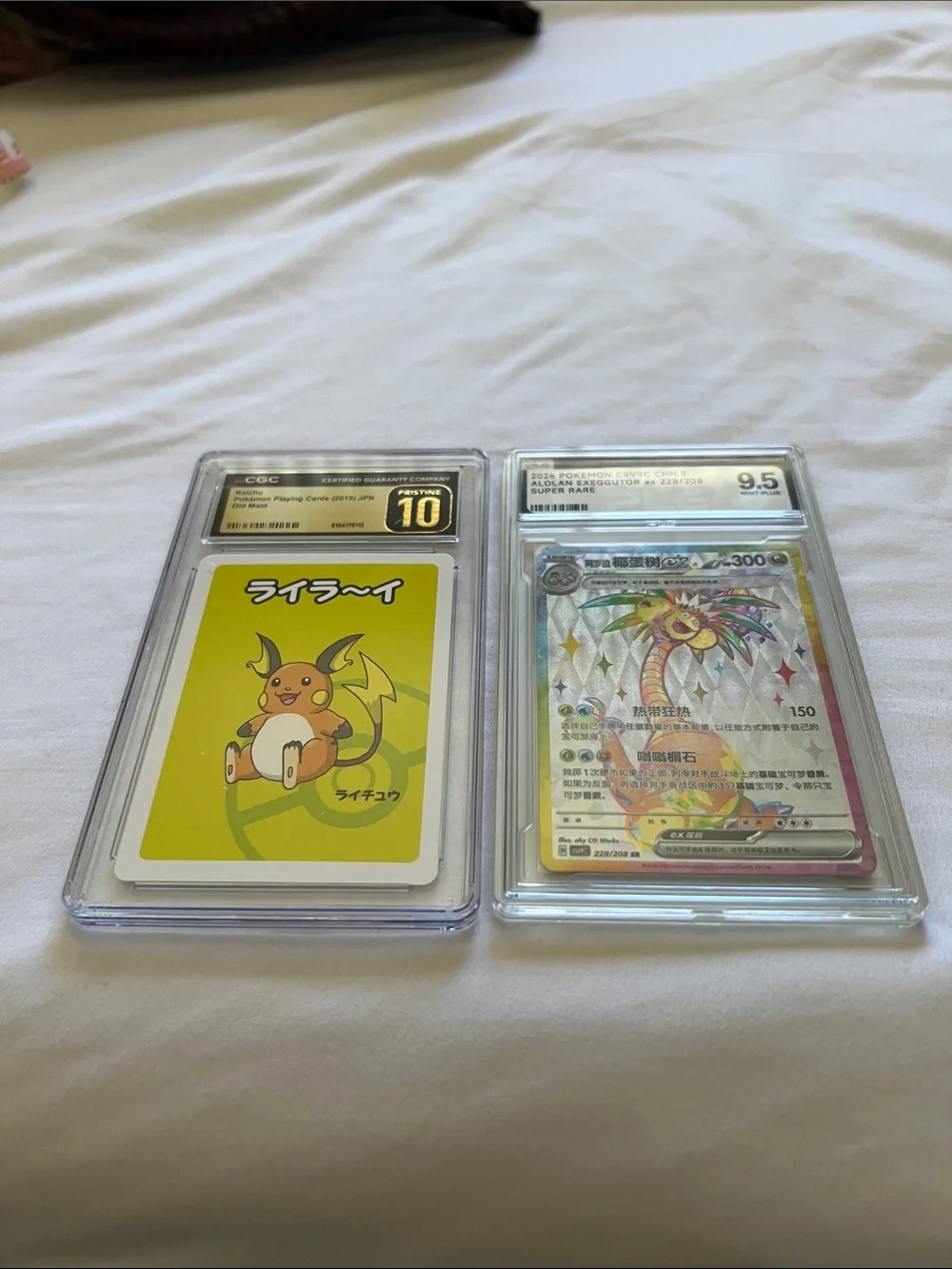 Pokemon Yellow Raichu & Alolan Exeggutor Graded Trading Cards